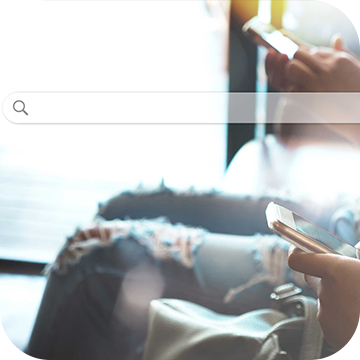 Local listings Person using their smartphone to look something up