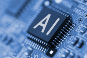 Close up of the of a computer with words AI.