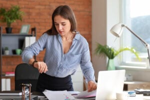 Stressed woman in office.
