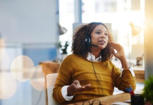 Woman in call, speaking or explaining something.